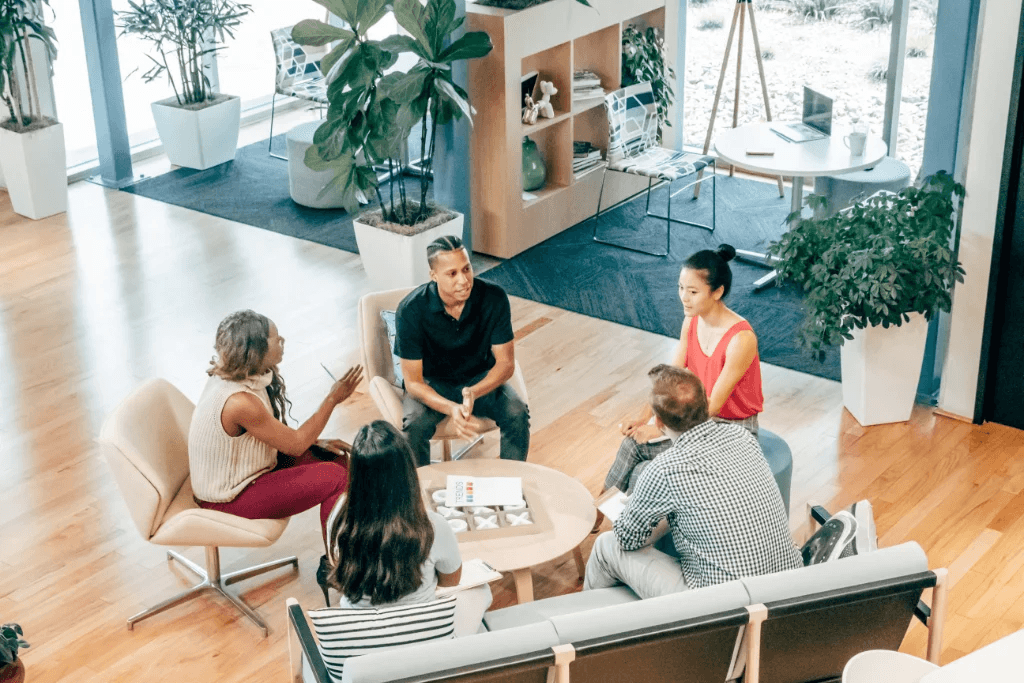 Accountant consulting with clients during a business meeting